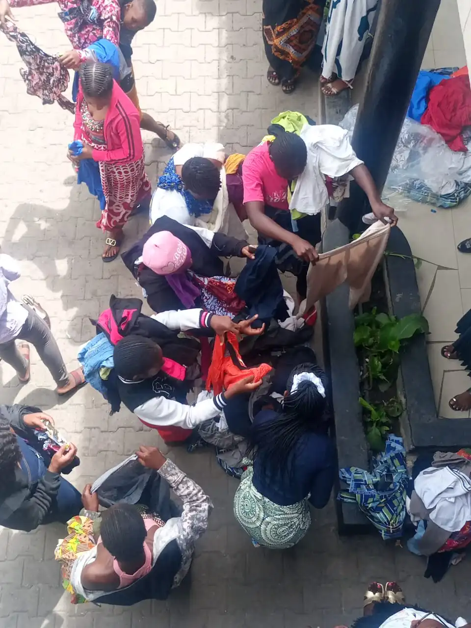 Embassy Ministries (HEM) distributing clothes during Hope Sunday