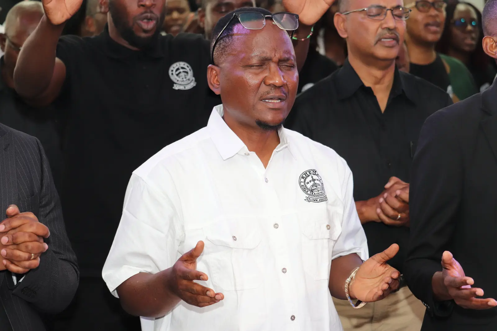 Richard Tumbu praying at RAAZ Ignite 2025 Richard Tumbu praying at RAAZ Ignite 2025