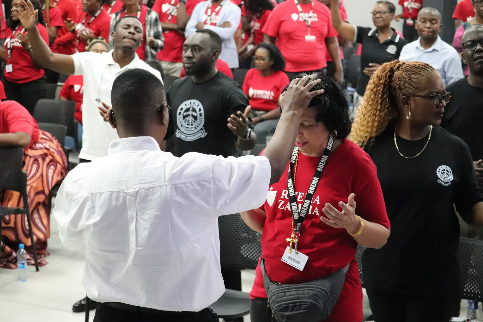 Richard Tumbu praying for a Rhema student at RAAZ Ignite 2025 Richard Tumbu praying for a Rhema student at RAAZ Ignite 2025