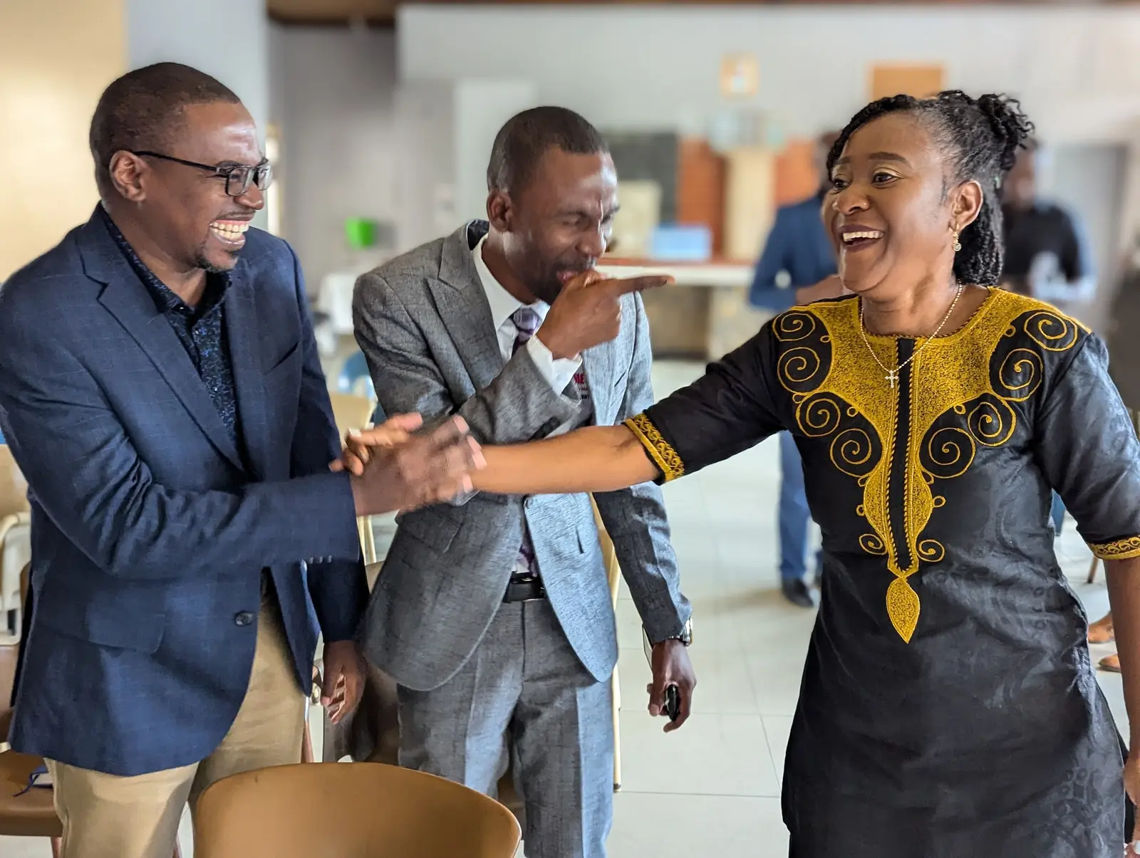 A group of Rhema alumni enjoying a laugh at a ministers fellowship event
